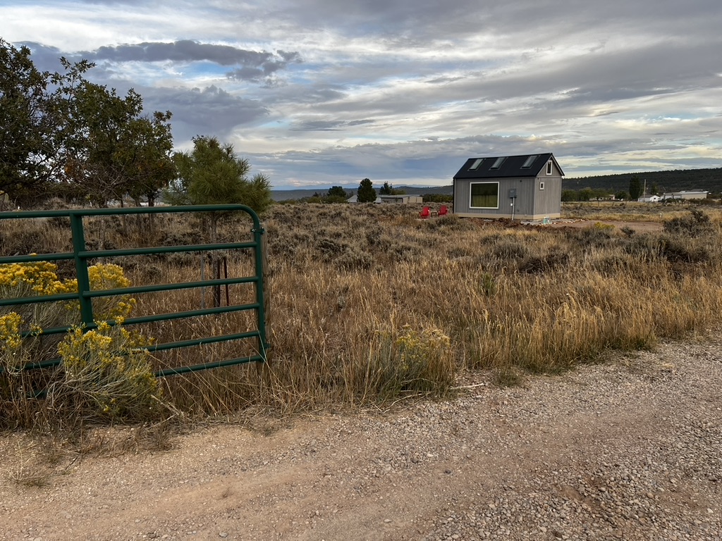 The first building you'll see is the Tiny Home.